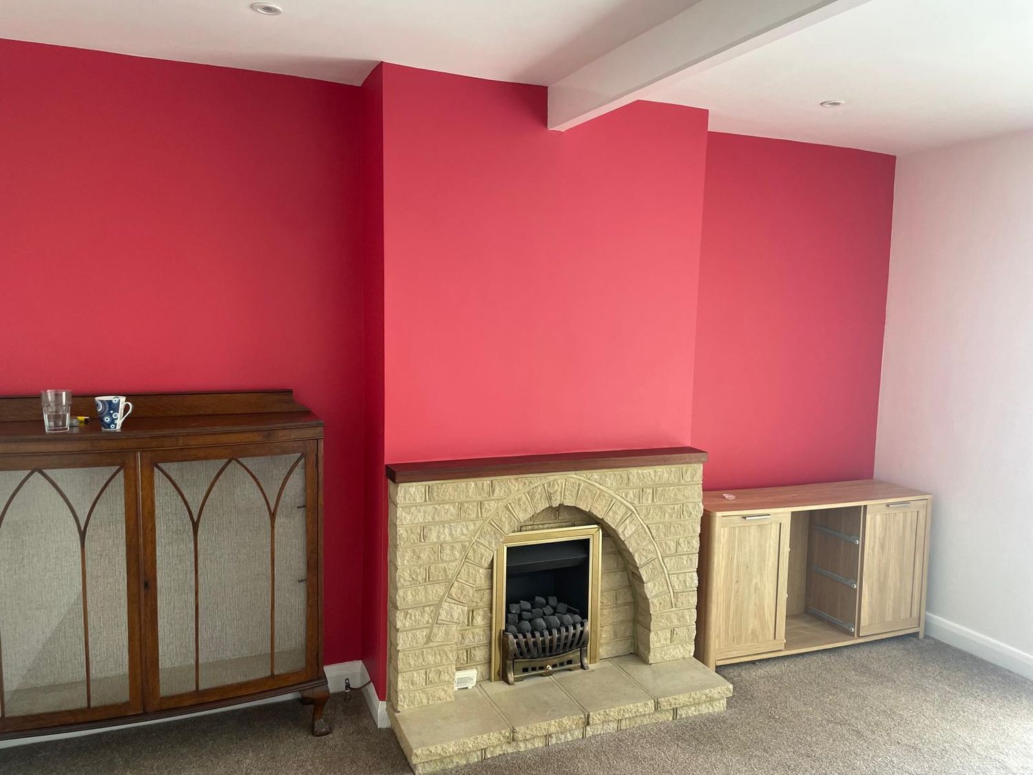 Decorated room with a bold painted feature wall