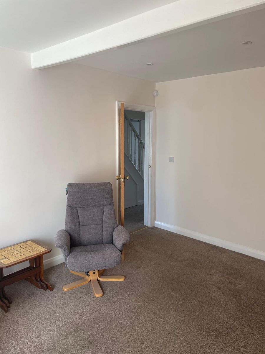 Freshly decorated living area with crisp woodwork
