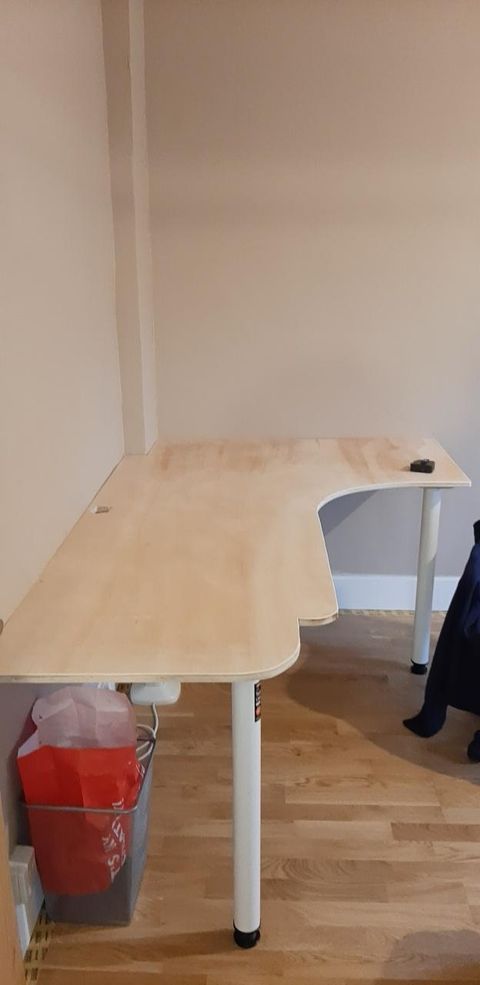 Home office with new flooring and decorated walls