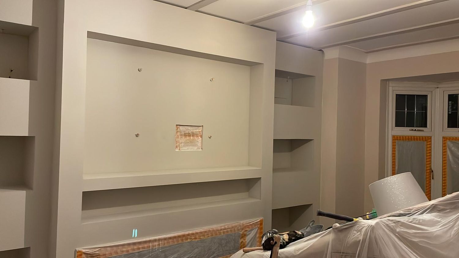 Living room wall before the fitted media unit was installed